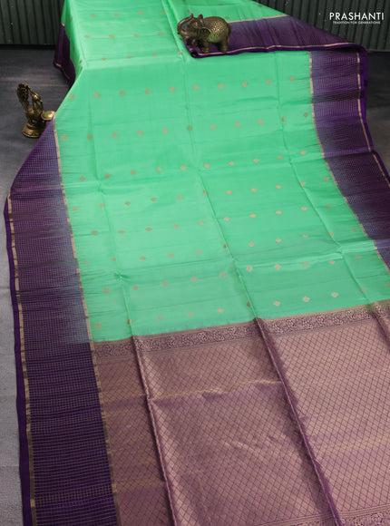 Pure soft silk saree teal green and violet with zari woven buttas and long zari woven checked border