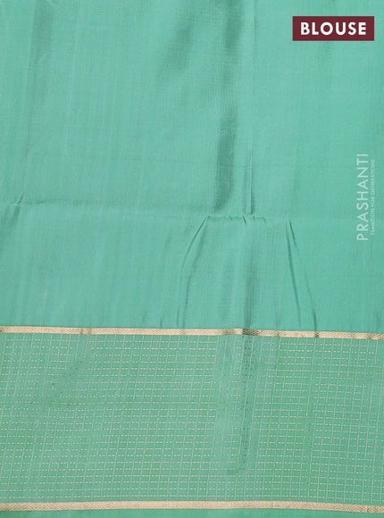 Pure soft silk saree maroon and teal green shade with allover zari woven buttas and long zari woven checked border