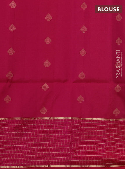 Pure soft silk saree bottle green and pink with allover zari woven buttas and long zari woven checked border