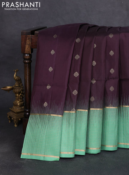 Pure soft silk saree coffee brown and teal green shade with allover zari woven buttas and long zari woven checked border