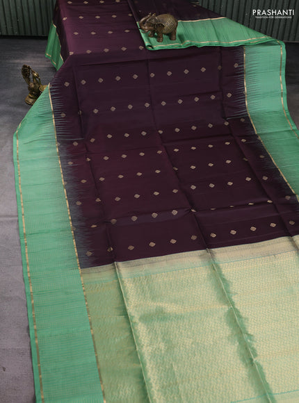 Pure soft silk saree coffee brown and teal green shade with allover zari woven buttas and long zari woven checked border
