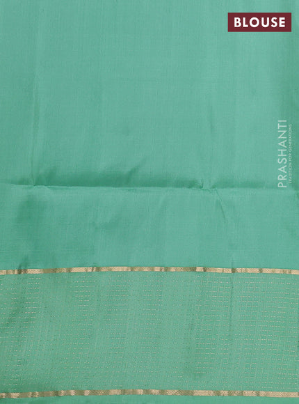 Pure soft silk saree coffee brown and teal green shade with allover zari woven buttas and long zari woven checked border