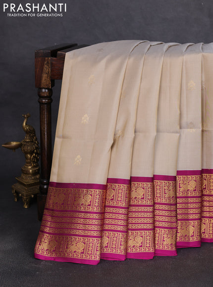 Pure soft silk saree beige and magenta pink with zari woven buttas and long zari woven border