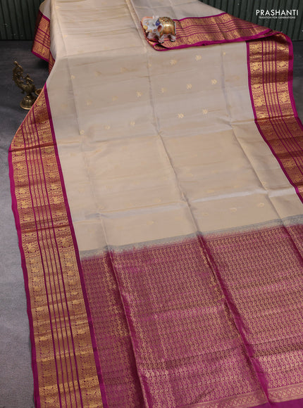 Pure soft silk saree beige and magenta pink with zari woven buttas and long zari woven border