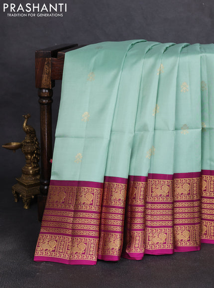 Pure soft silk saree pastel green and dark magenta pink with zari woven buttas and long zari woven border