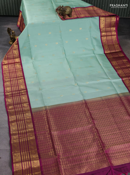 Pure soft silk saree pastel green and dark magenta pink with zari woven buttas and long zari woven border