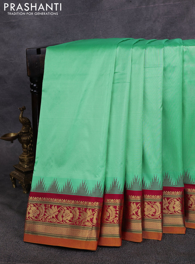 10 Yards pure kanchipuram silk saree teal green shade and maroon with plain body and temple design zari woven border