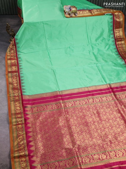10 Yards pure kanchipuram silk saree teal green shade and maroon with plain body and temple design zari woven border