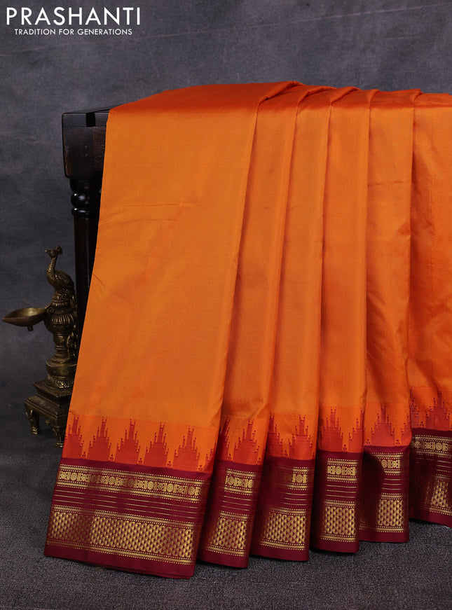 10 Yards pure kanchipuram silk saree orange and maroon with plain body and temple design zari woven border