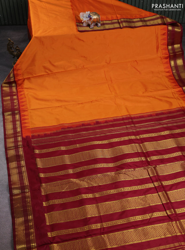 10 Yards pure kanchipuram silk saree orange and maroon with plain body and temple design zari woven border