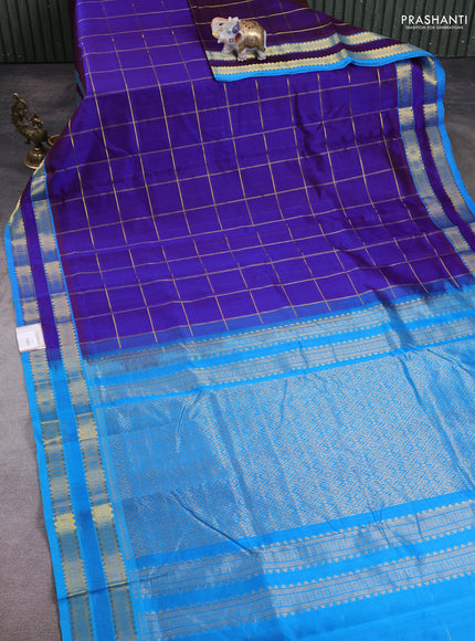 10 Yards silk cotton saree dual shade of violet and cs blue with allover zari woven checked pattern and rettapet zari woven border