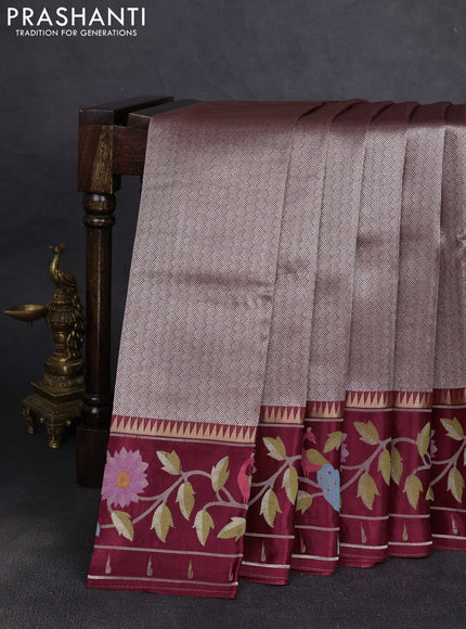 Banarasi silk saree wine shade with allover zari woven brocade weaves and paithani style border