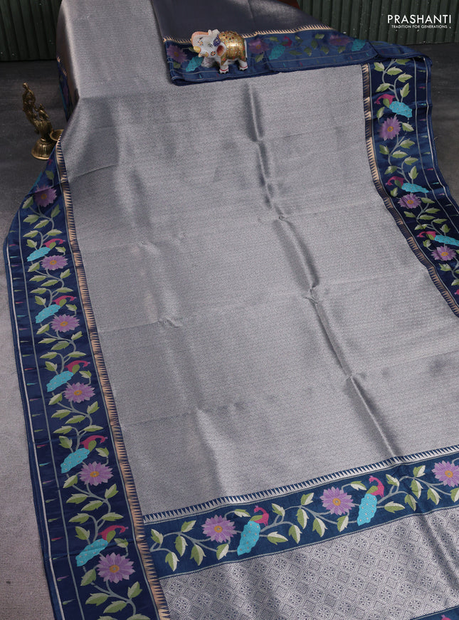 Banarasi silk saree peacock blue with allover zari woven brocade weaves and paithani style border