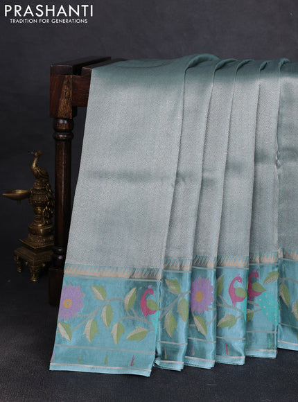 Banarasi silk saree pastel blue with allover zari woven brocade weaves and paithani style border