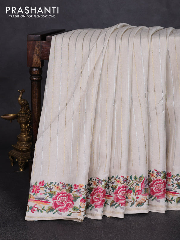 Semi tussar saree off white with allover silver & zari stripe pattern and convent embroidery border