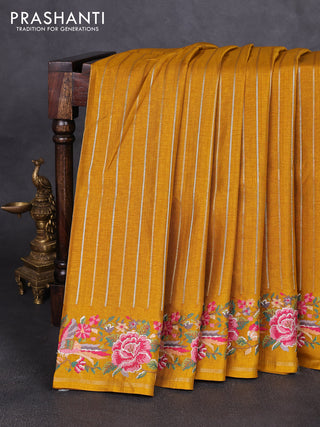 Semi tussar saree mustard yellow with allover silver & zari stripe pattern and convent embroidery border