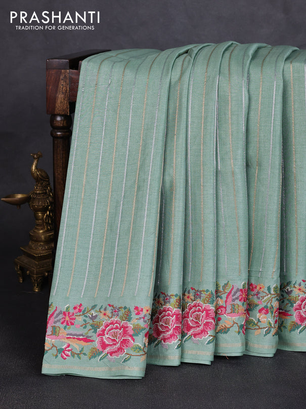 Semi tussar saree pastel green with allover silver & zari stripe pattern and convent embroidery border