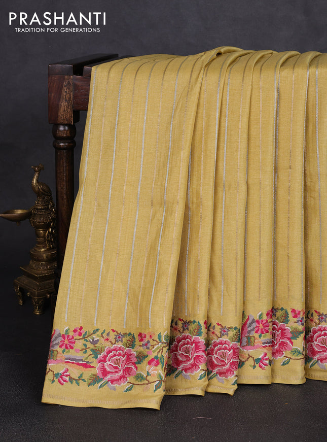 Semi tussar saree pale yellow with allover silver & zari stripe pattern and convent embroidery border