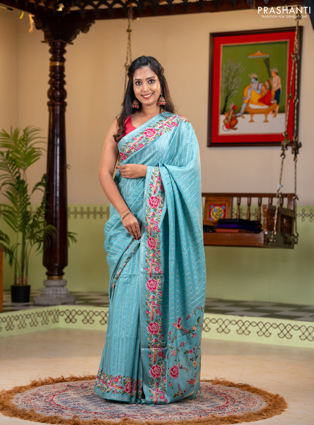 Semi tussar saree teal blue with allover silver & zari stripe pattern and convent embroidery border