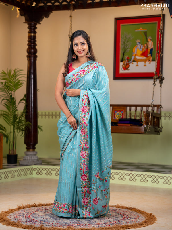 Semi tussar saree teal blue with allover silver & zari stripe pattern and convent embroidery border