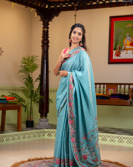 Semi tussar saree teal blue with allover silver & zari stripe pattern and convent embroidery border