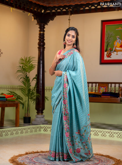 Semi tussar saree teal blue with allover silver & zari stripe pattern and convent embroidery border