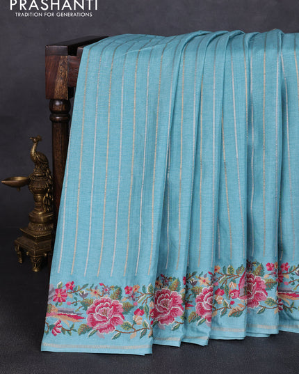 Semi tussar saree teal blue with allover silver & zari stripe pattern and convent embroidery border