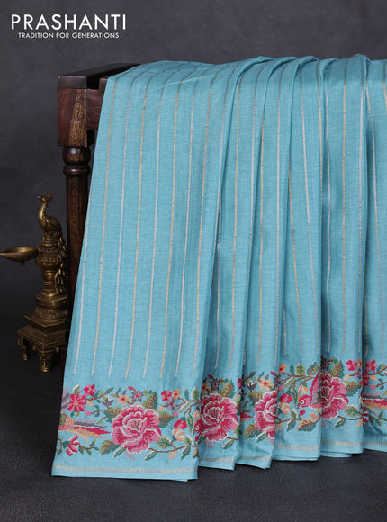 Semi tussar saree teal blue with allover silver & zari stripe pattern and convent embroidery border
