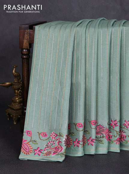 Semi tussar saree pastel green with allover silver & zari stripe pattern and convent embroidery border