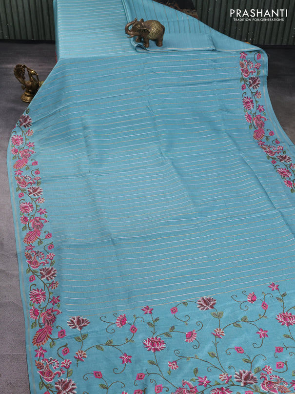 Semi tussar saree teal blue with allover silver & zari stripe pattern and convent embroidery border