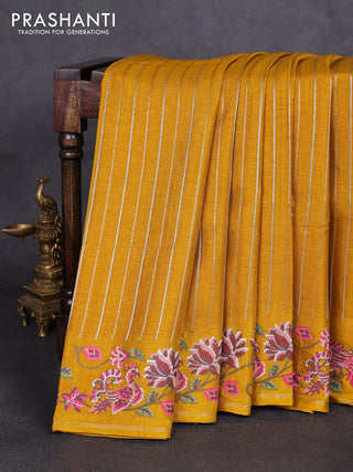 Semi tussar saree mustard yellow with allover silver & zari stripe pattern and convent embroidery border