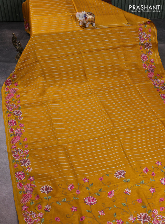 Semi tussar saree mustard yellow with allover silver & zari stripe pattern and convent embroidery border