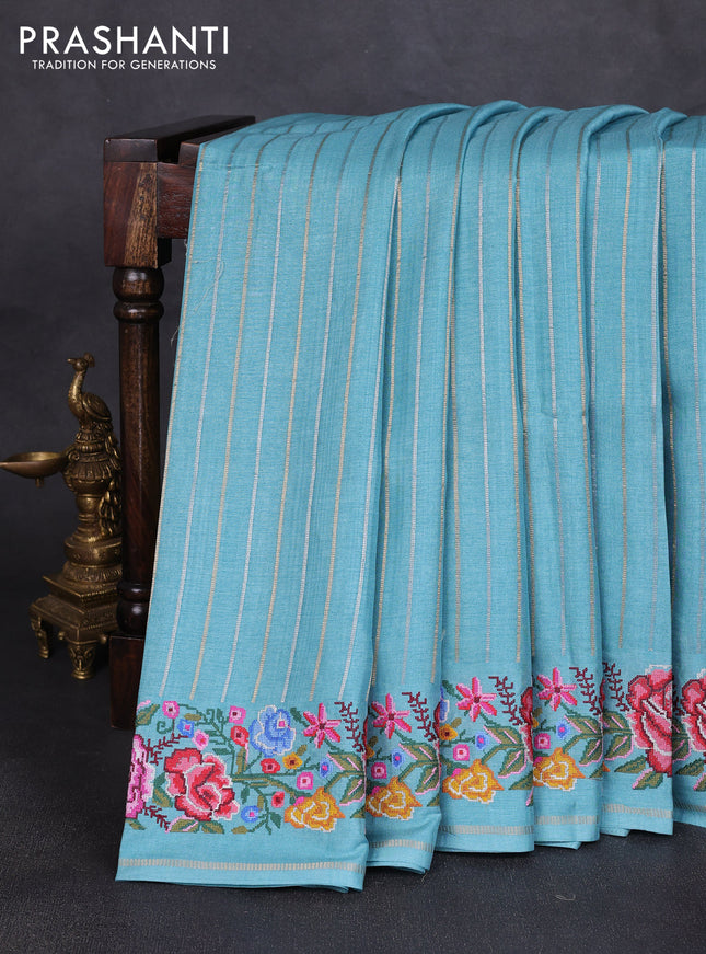 Semi tussar saree pastel blue with allover silver & zari stripe pattern and convent embroidery border
