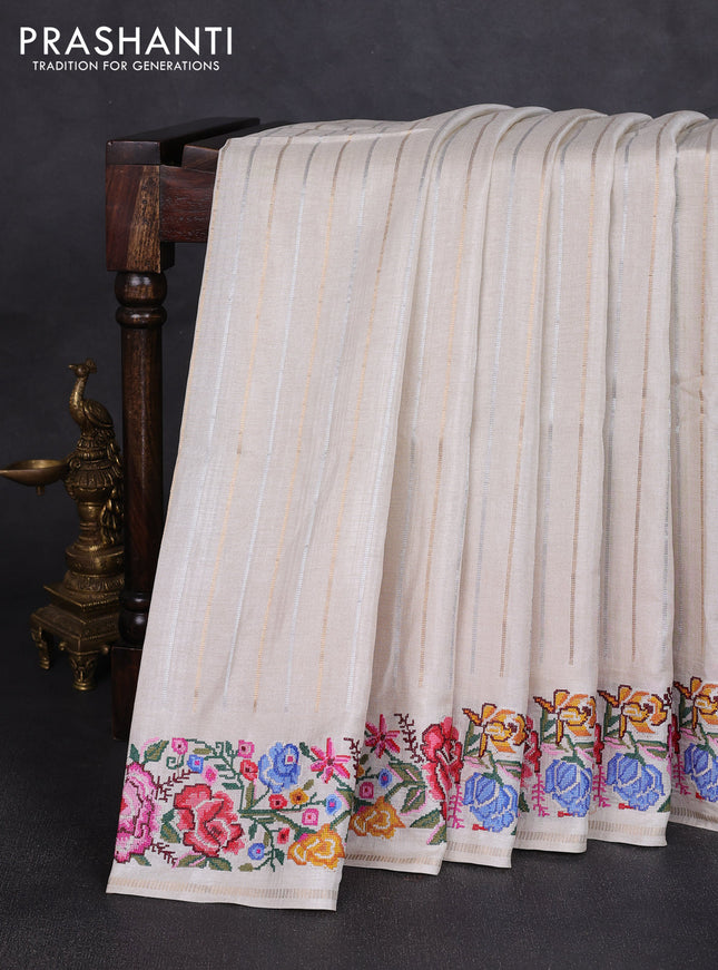 Semi tussar saree off white with allover silver & zari stripe pattern and convent embroidery border