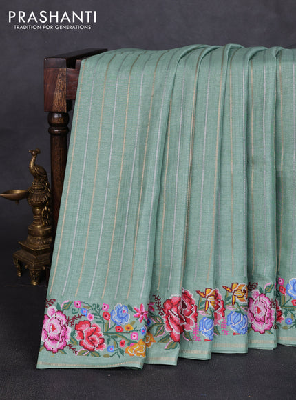 Semi tussar saree pastel green with allover silver & zari stripe pattern and convent embroidery border