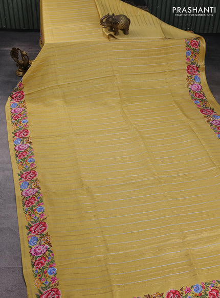 Semi tussar saree pale yellow with allover silver & zari stripe pattern and convent embroidery border