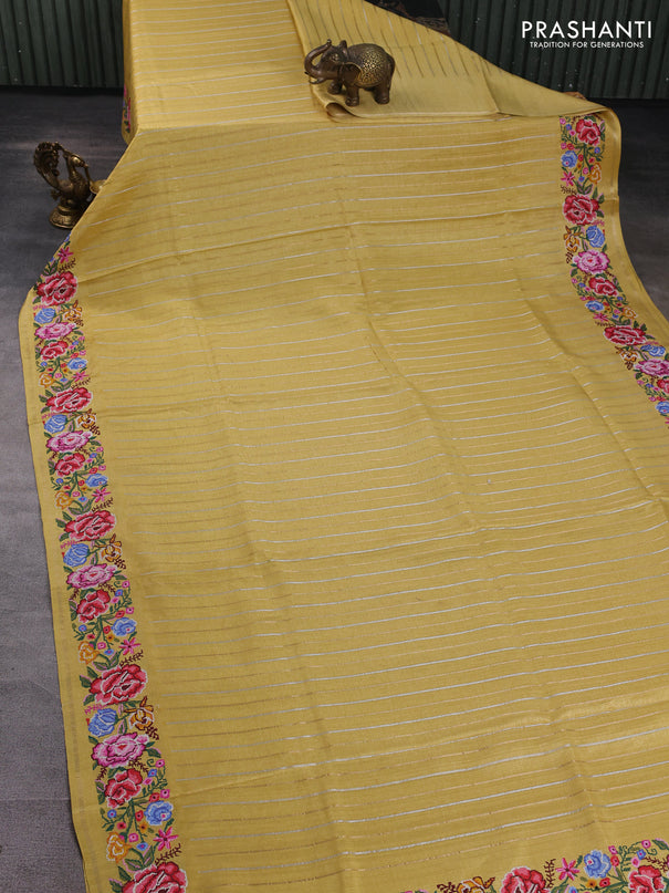 Semi tussar saree pale yellow with allover silver & zari stripe pattern and convent embroidery border