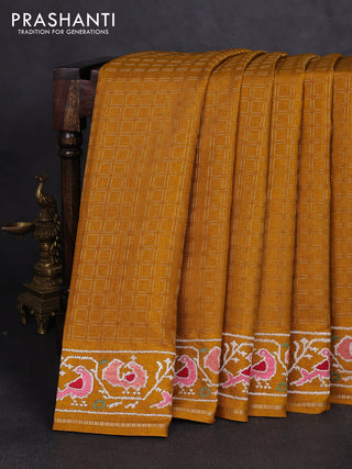 Semi tussar saree mustard yellow with allover zari checked pattern and embroidery border