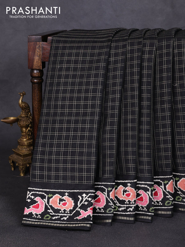 Semi tussar saree black with allover zari checked pattern and embroidery border