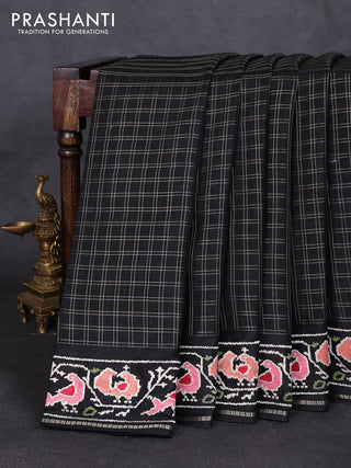 Semi tussar saree black with allover zari checked pattern and embroidery border