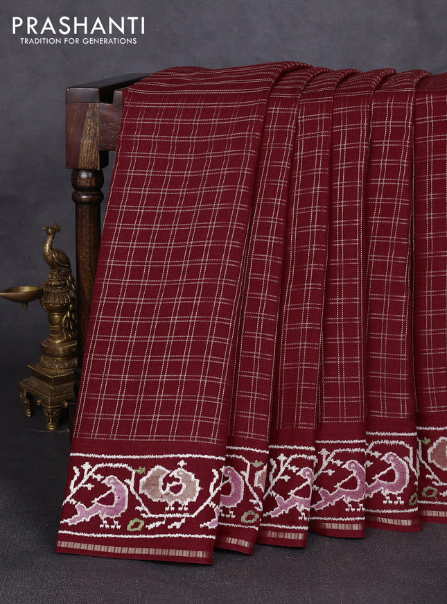 Semi tussar saree deep maroon with allover zari checked pattern and embroidery border