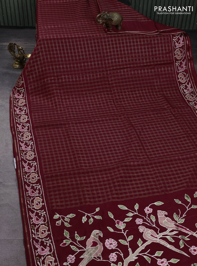Semi tussar saree deep maroon with allover zari checked pattern and embroidery border