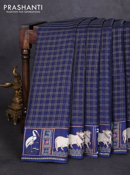 Semi tussar saree navy blue with allover zari checked pattern and pihwai embroidery border