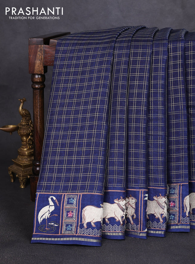 Semi tussar saree navy blue with allover zari checked pattern and pihwai embroidery border