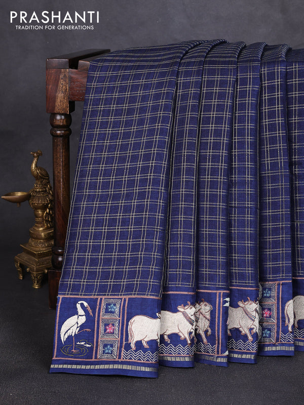 Semi tussar saree navy blue with allover zari checked pattern and pihwai embroidery border