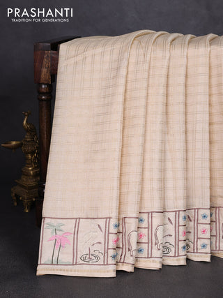 Semi tussar saree beige with allover zari checked pattern and pihwai embroidery border