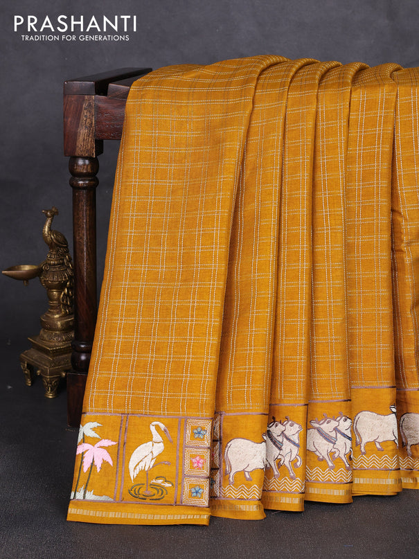 Semi tussar saree mustard yellow with allover zari checked pattern and pihwai embroidery border