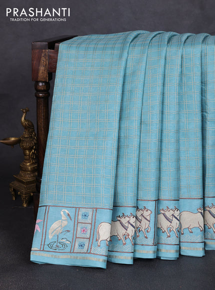 Semi tussar saree pastel blue with allover zari checked pattern and pihwai embroidery border