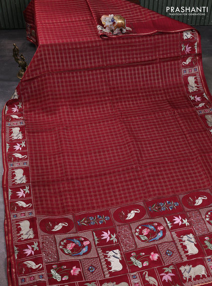 Semi tussar saree deep maroon with allover zari checked pattern and pihwai embroidery border
