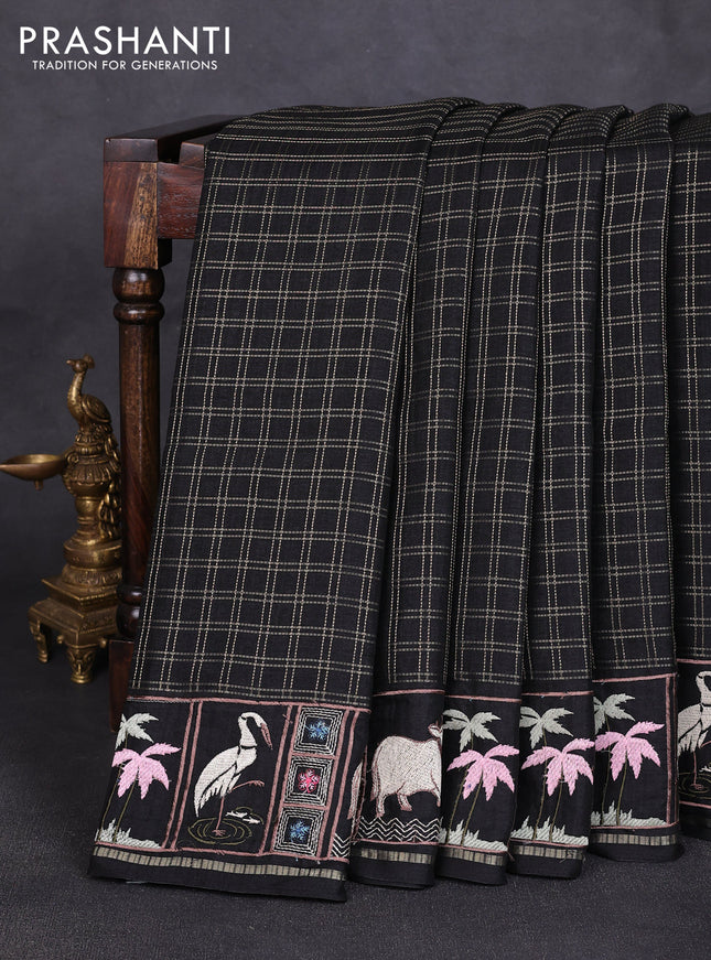 Semi tussar saree black with allover zari checked pattern and pihwai embroidery border